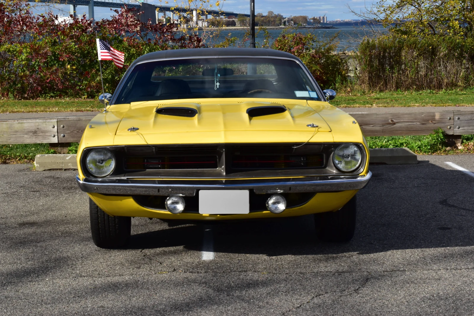 'Cuda with an American flag in the background